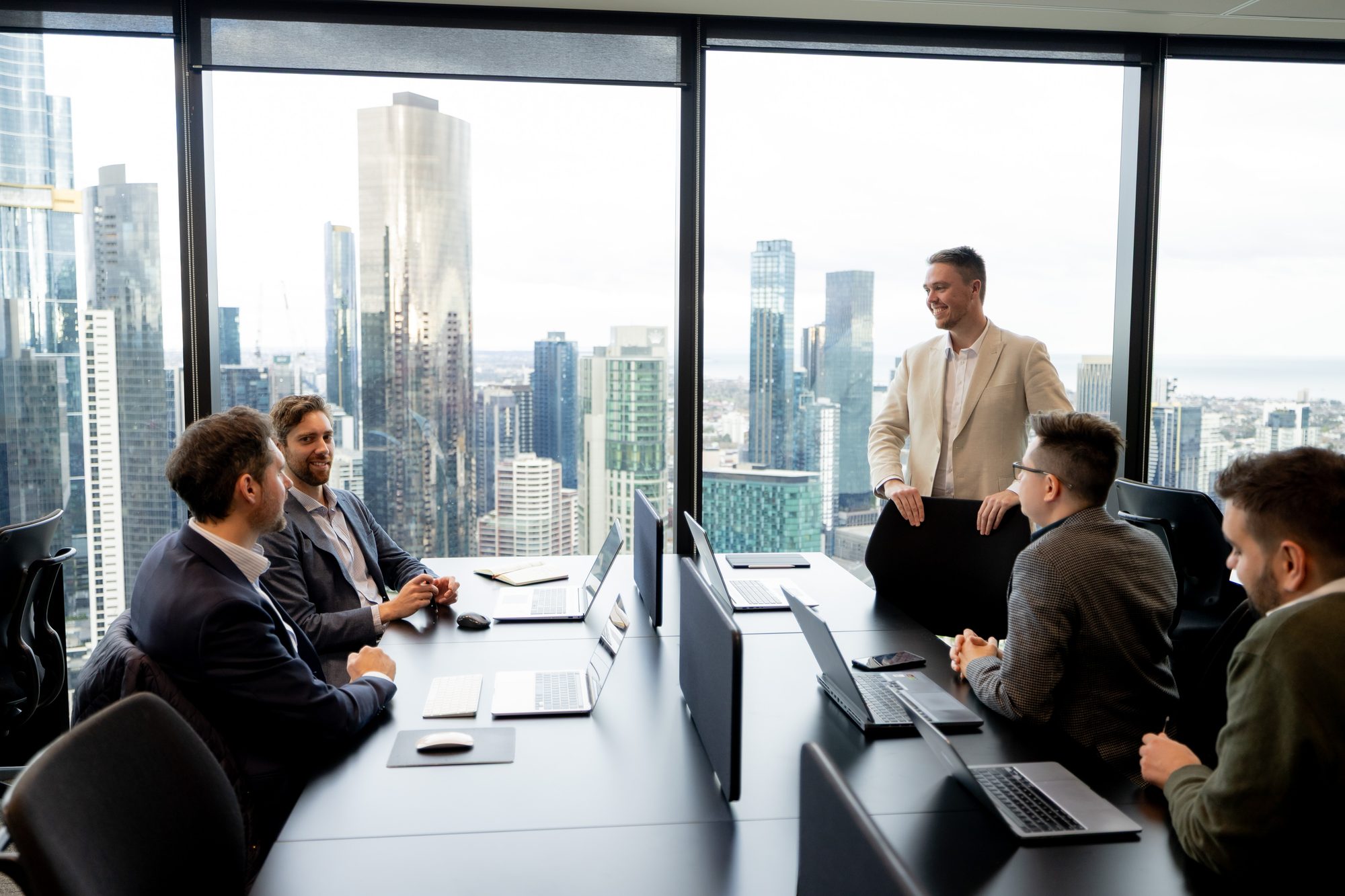 Vokke team presenting in a boardroom